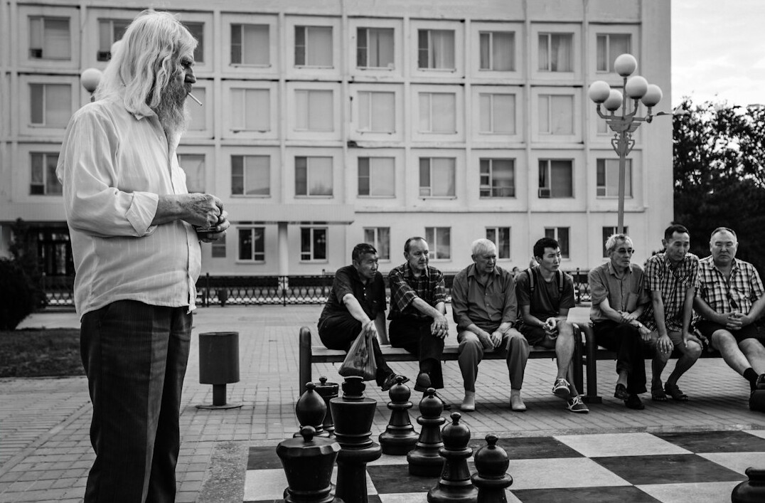 Trainer leading a negotiation workshop in front of a group