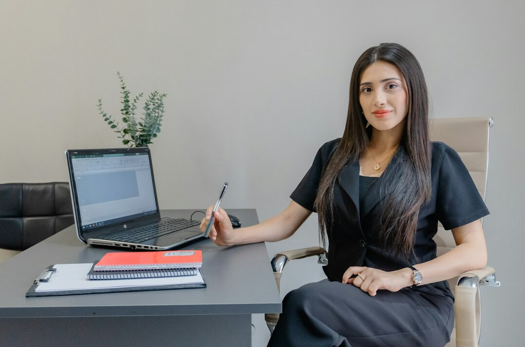 confident negotiator at desk
