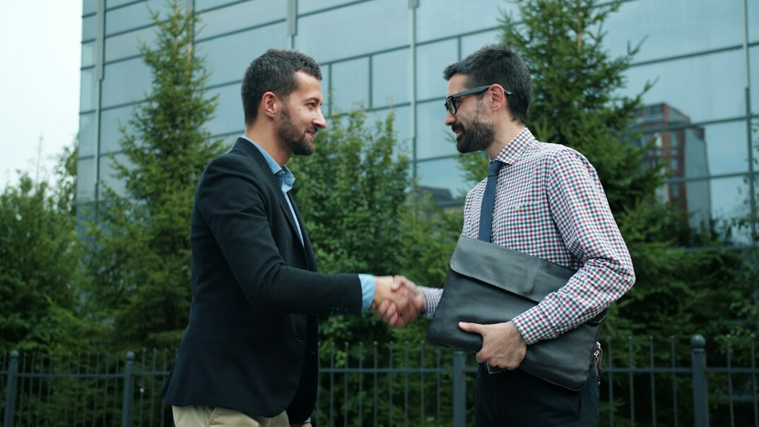 business people negotiating in meeting room