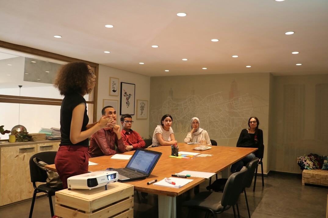 woman leading negotiation workshop